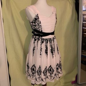 Disney princess silhouette dress in baby pink